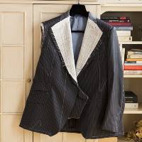 Detalle del estado de confección de un traje